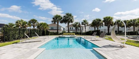 A heated pool, pool loungers