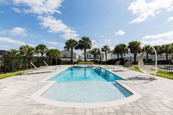 A heated pool, pool loungers