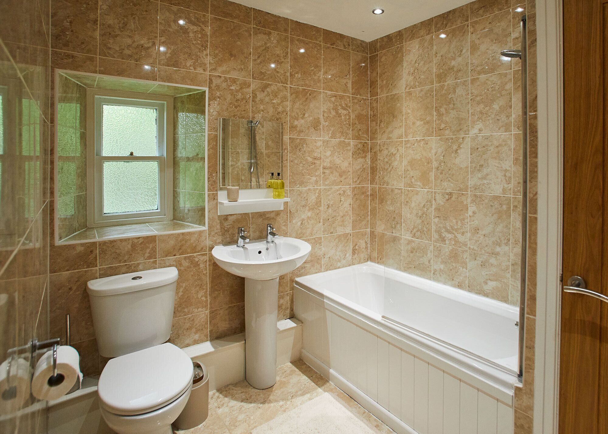 Bumblebee Cottage | Bathroom | Separate bathtub and shower, free toiletries, hair dryer, towels
