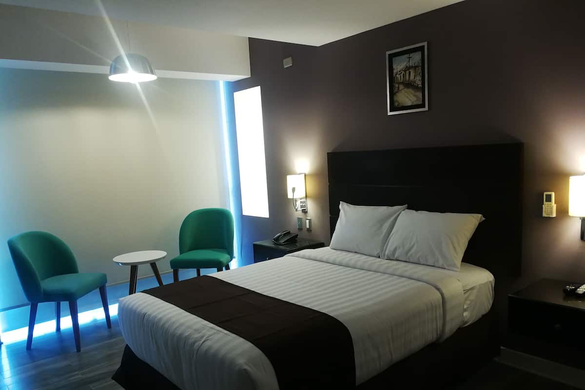 Caja de seguridad en la habitación y cortinas blackout