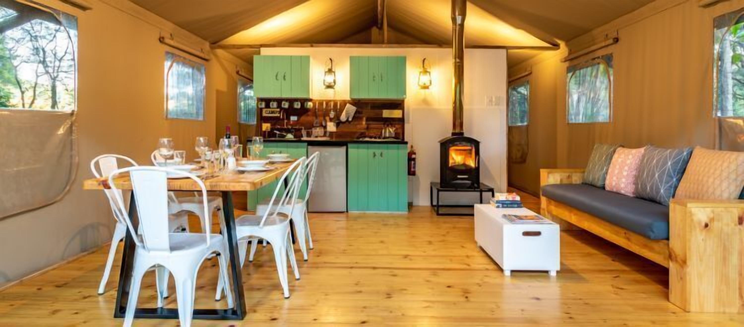 Luxury Tent, 2 Bedrooms | Living area | Fireplace