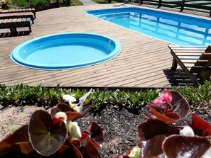 Outdoor pool, pool umbrellas, pool loungers