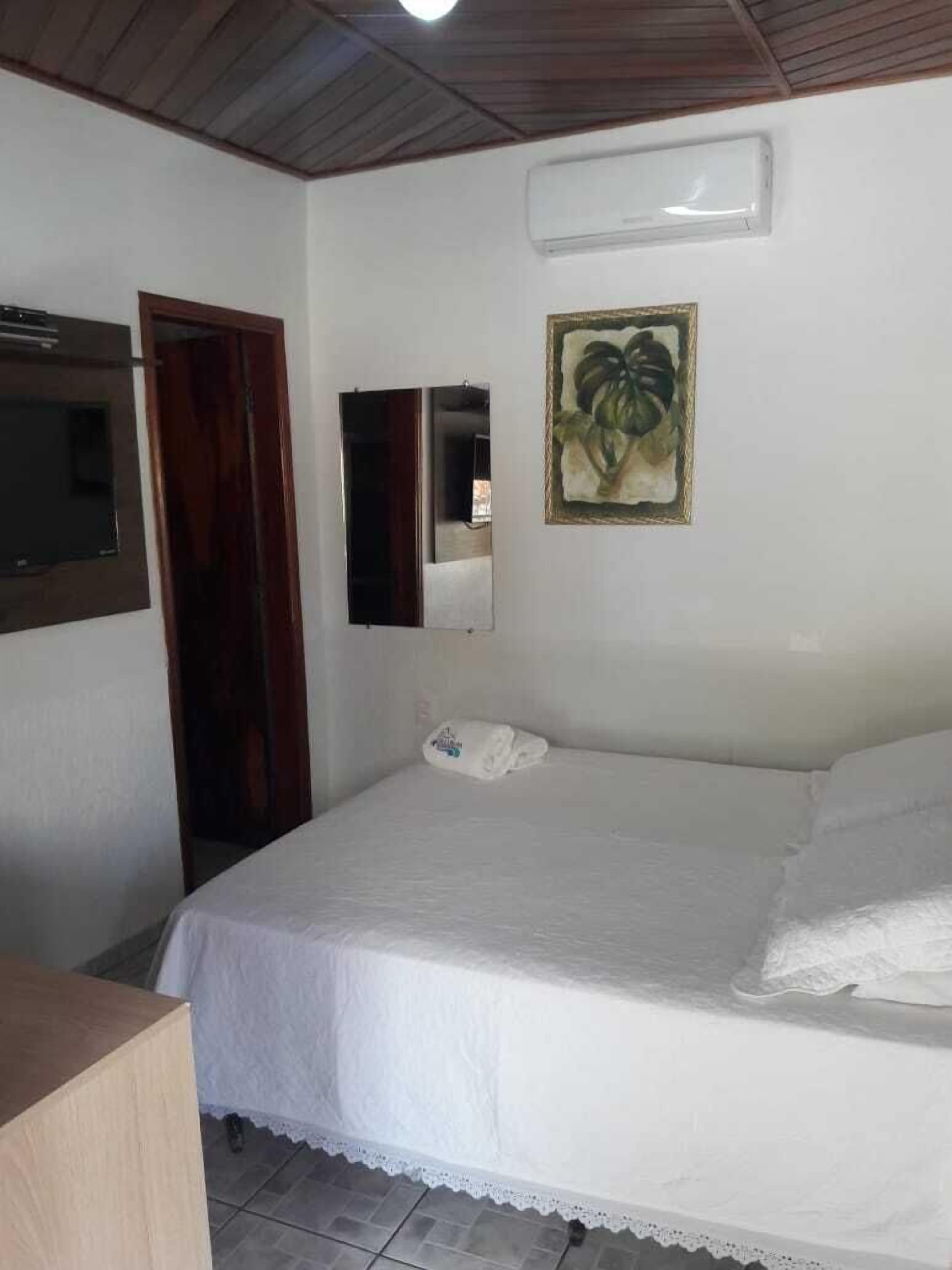 Quarto casal | Cortinas blackout, ferros/tábuas de passar roupa, Wi-Fi de cortesia