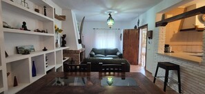 Smart TV, fireplace, books, offices