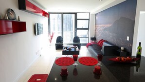 Deluxe Apartment, 1 Bedroom | Living area - Dune Properties (Cape Town)