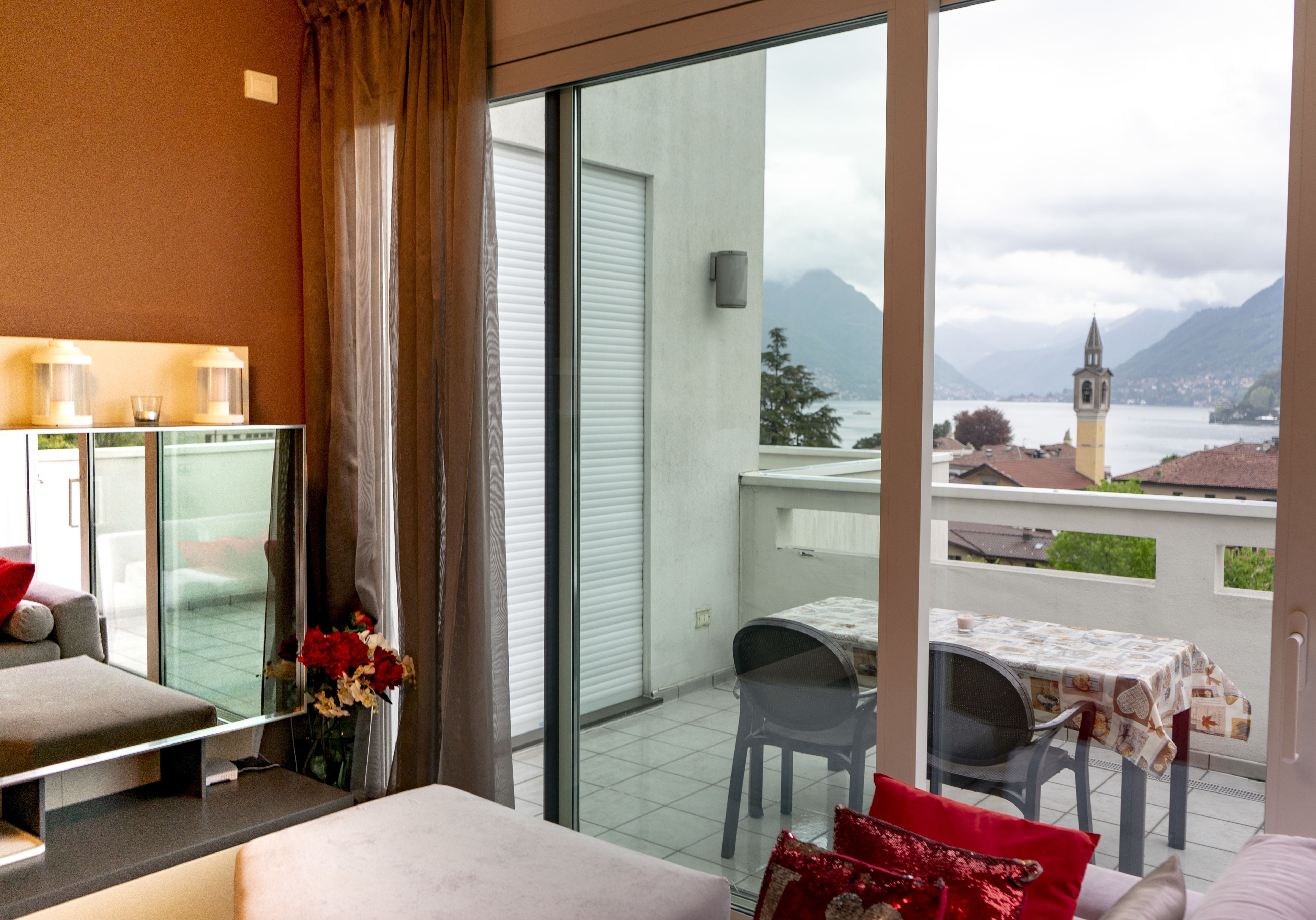 Deluxe Apartment, Lake View | Living area | 42-inch flat-screen TV with digital channels, TV, video game console