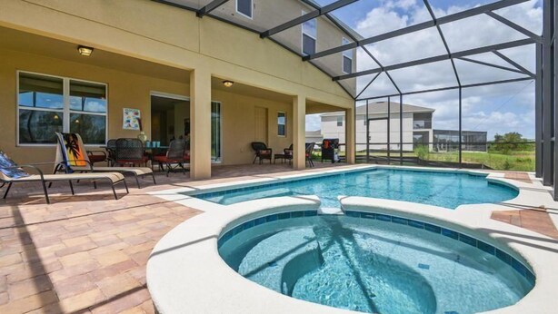 Outdoor pool - 8BR 8BA Pool Home Near Disney In Gated (Davenport)
