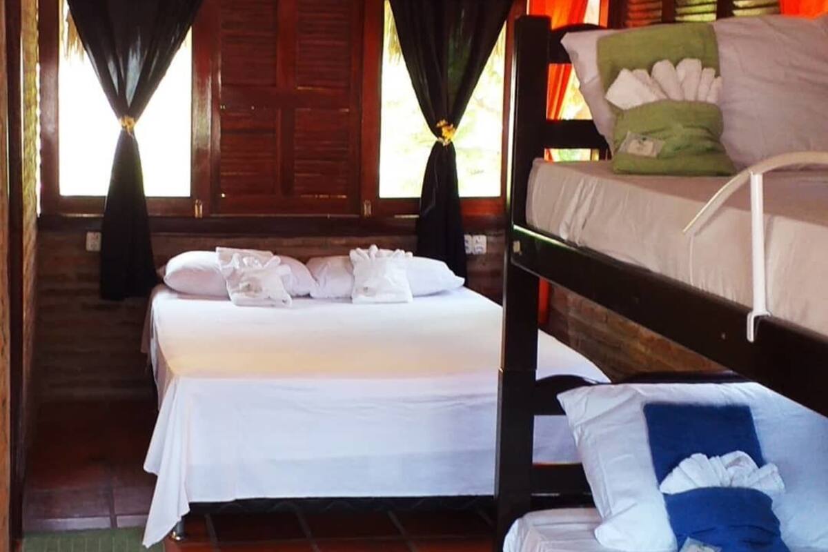 Deluxe-Vierbettzimmer | Minibar, kostenloses WLAN, Bettwäsche