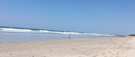 On the beach, sun loungers, beach towels