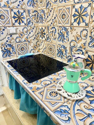 A la maison "Ortigia Dreaming" Suite sur deux niveaux avec 7 lits confortables.