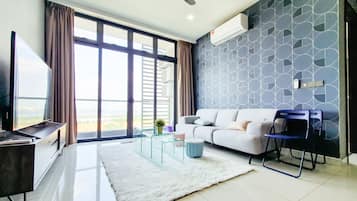 Condo, 2 Bedrooms, Non Smoking, Sea View | Living room | Flat-screen TV