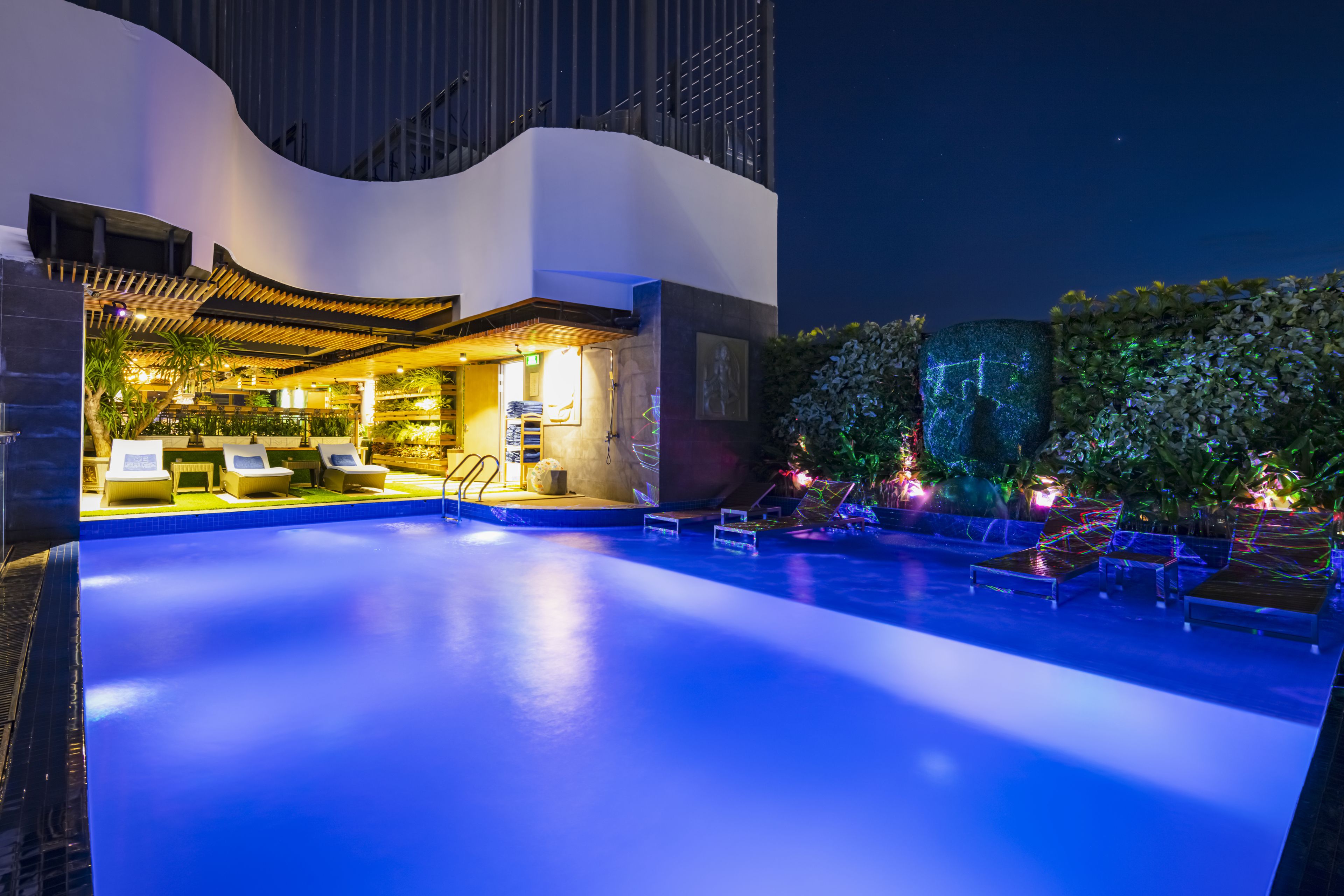 Outdoor pool, open 6:00 AM to 10:00 PM, pool umbrellas, pool loungers