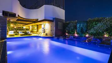 Outdoor pool, open 6:00 AM to 10:00 PM, pool umbrellas, pool loungers