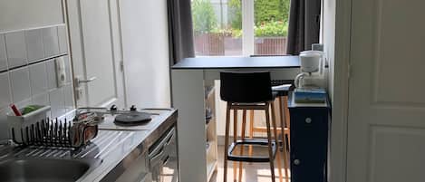 Fridge, microwave, coffee/tea maker, toaster