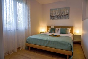 2 chambres, fer et planche à repasser, Wi-Fi, draps fournis