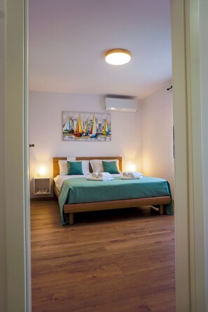 2 habitaciones, tabla de planchar con plancha, wifi y ropa de cama