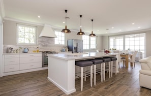 Fridge, stovetop, dishwasher, coffee/tea maker