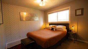 4 bedrooms, memory foam beds, desk, iron/ironing board