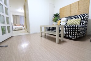 Economy Apartment | Living area | Flat-screen TV, fireplace - Residence Osaka Nipponbashi (Osaka)