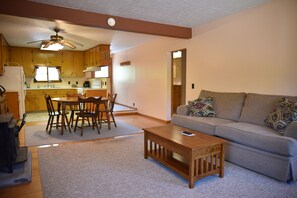 Deluxe Room | Living area | Flat-screen TV