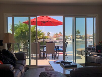 Discovery Bay Deep water home near launch and marina.