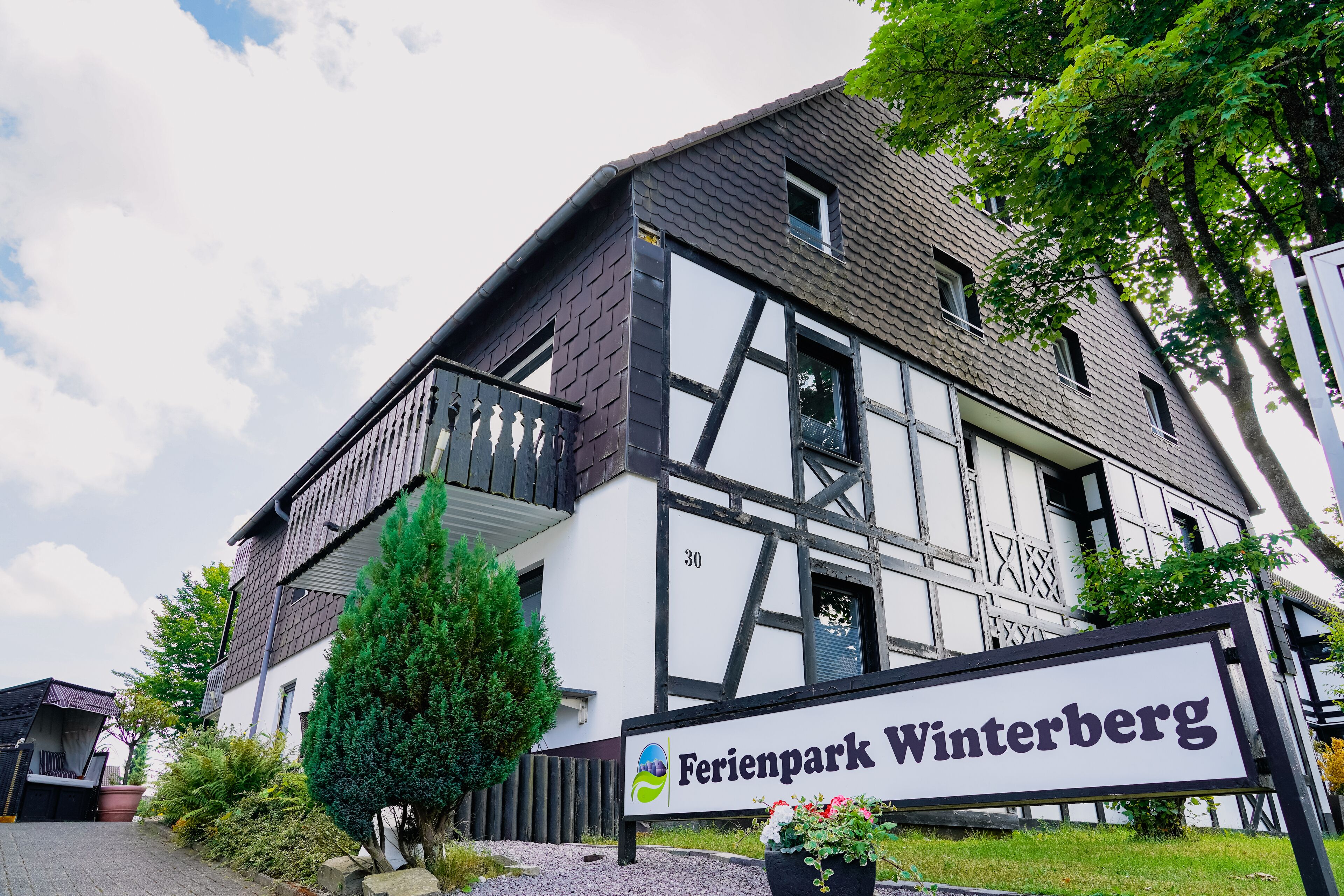 A building with a sign reading "Ferienpark Winterberg."