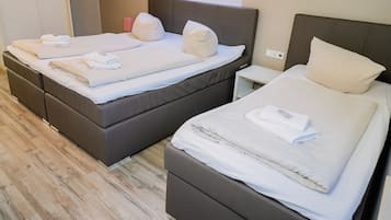 Apartemen Klasik | 1 kamar tidur, seprai antialergi, dan ruang kerja ramah laptop