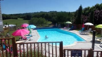 Seasonal outdoor pool, pool umbrellas, sun loungers