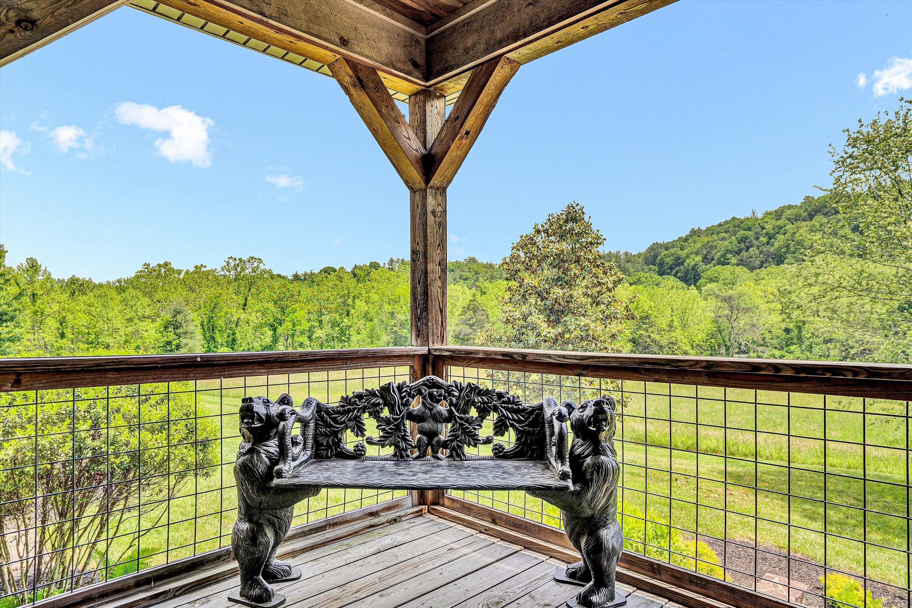 Screened in back porch overlooking the river