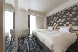 Habitació amb dos llits individuals executiva | Cobrellits, caixa forta a l'habitació i escriptori