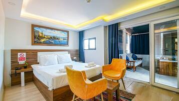 Elite Suite, 1 Queen Bed, City View | In-room safe, individually decorated, individually furnished