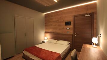 1 camera, una scrivania, insonorizzazione