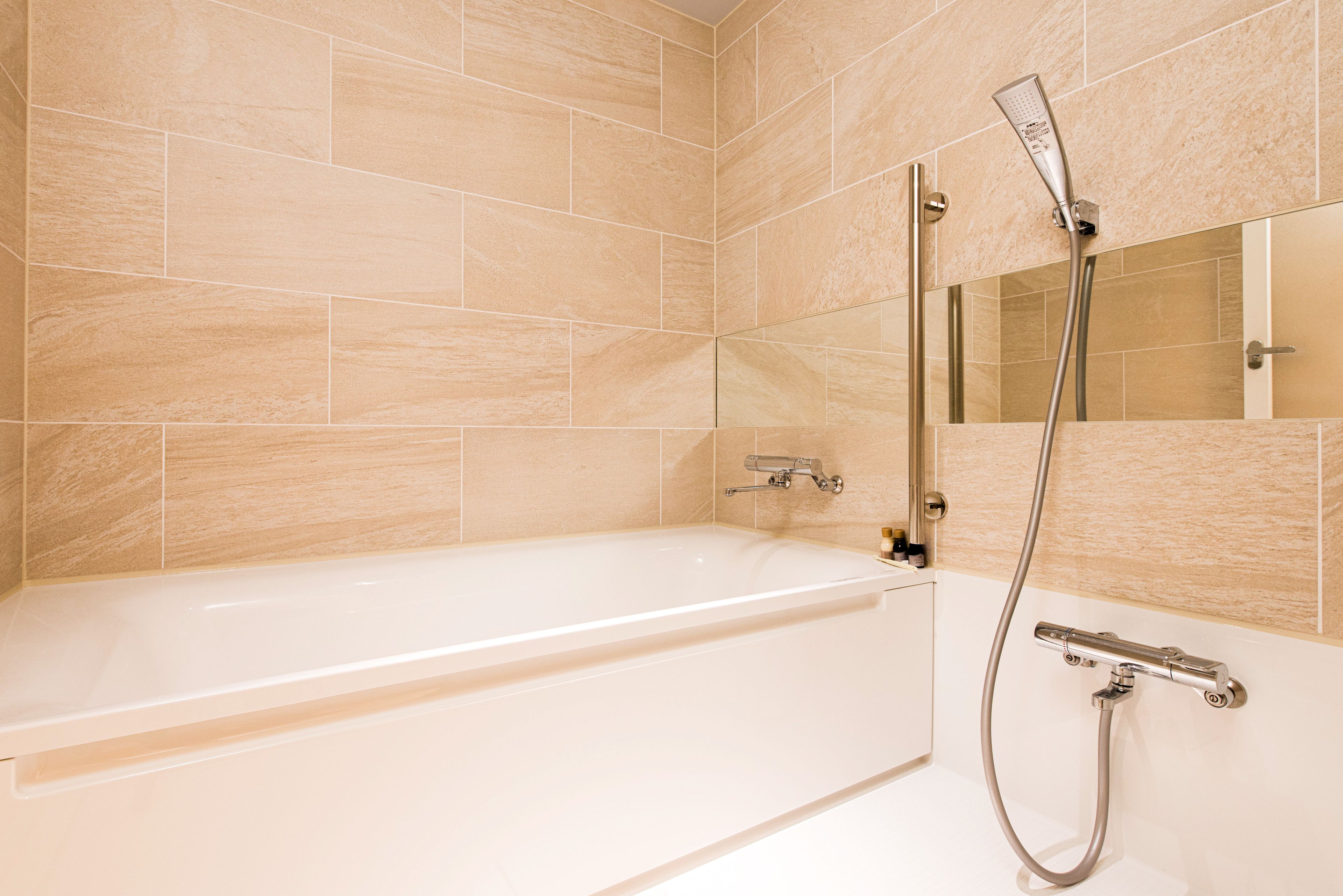 separate bathtub and shower, free toiletries, hair dryer, slippers