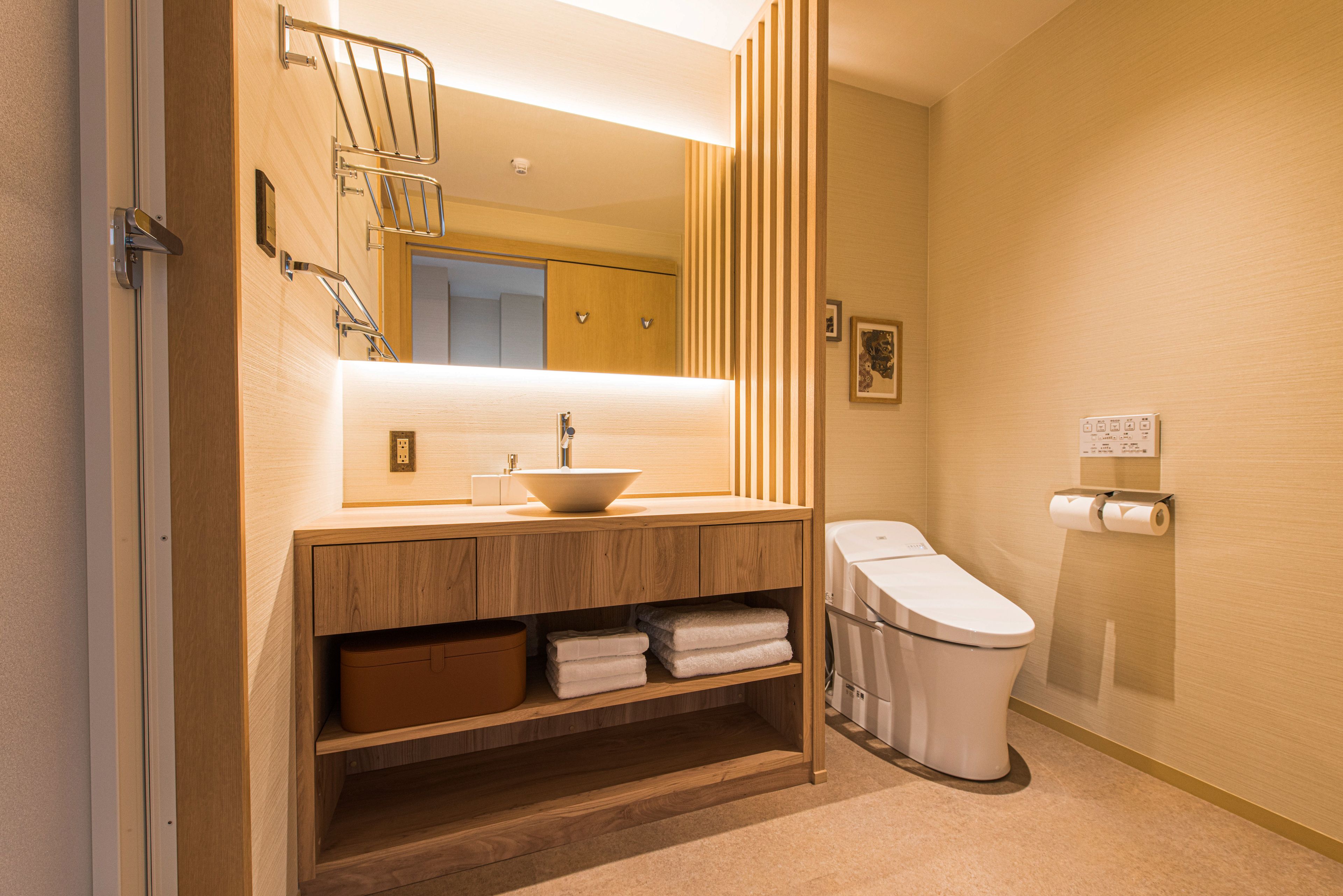 deluxe room (wakamatsu) | bathroom | separate bathtub and shower, free toiletries, hair dryer, slippers
