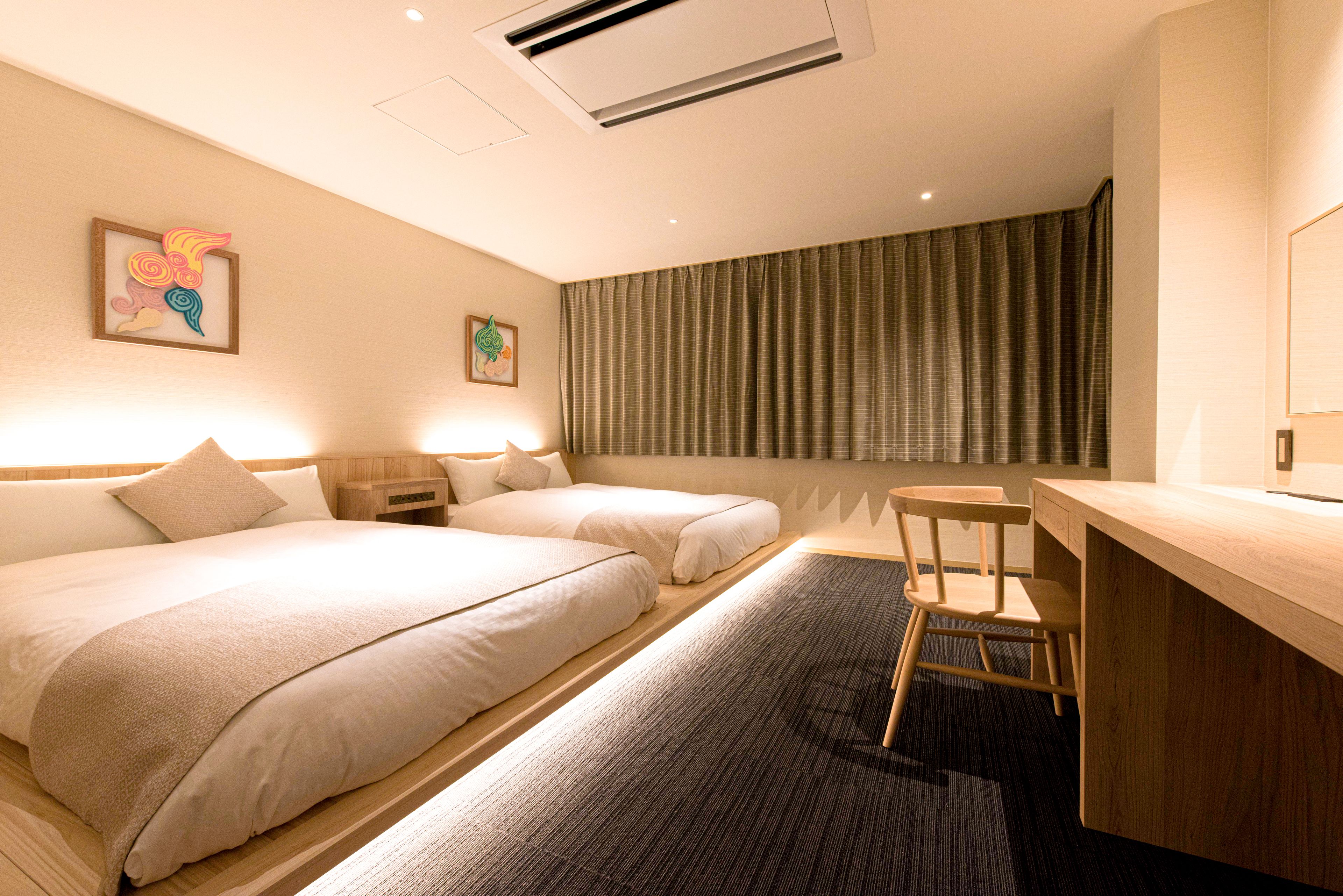 deluxe family room (shishi) | 1 bedroom, minibar, in-room safe, desk