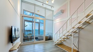 Room (D201 (Spa, Ocean View)) | Living area | TV - Yesu J Plus Pension (Yeosu)