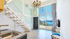 Room (A101 (Ocean View)) | Living area | TV - Yesu J Plus Pension (Yeosu)