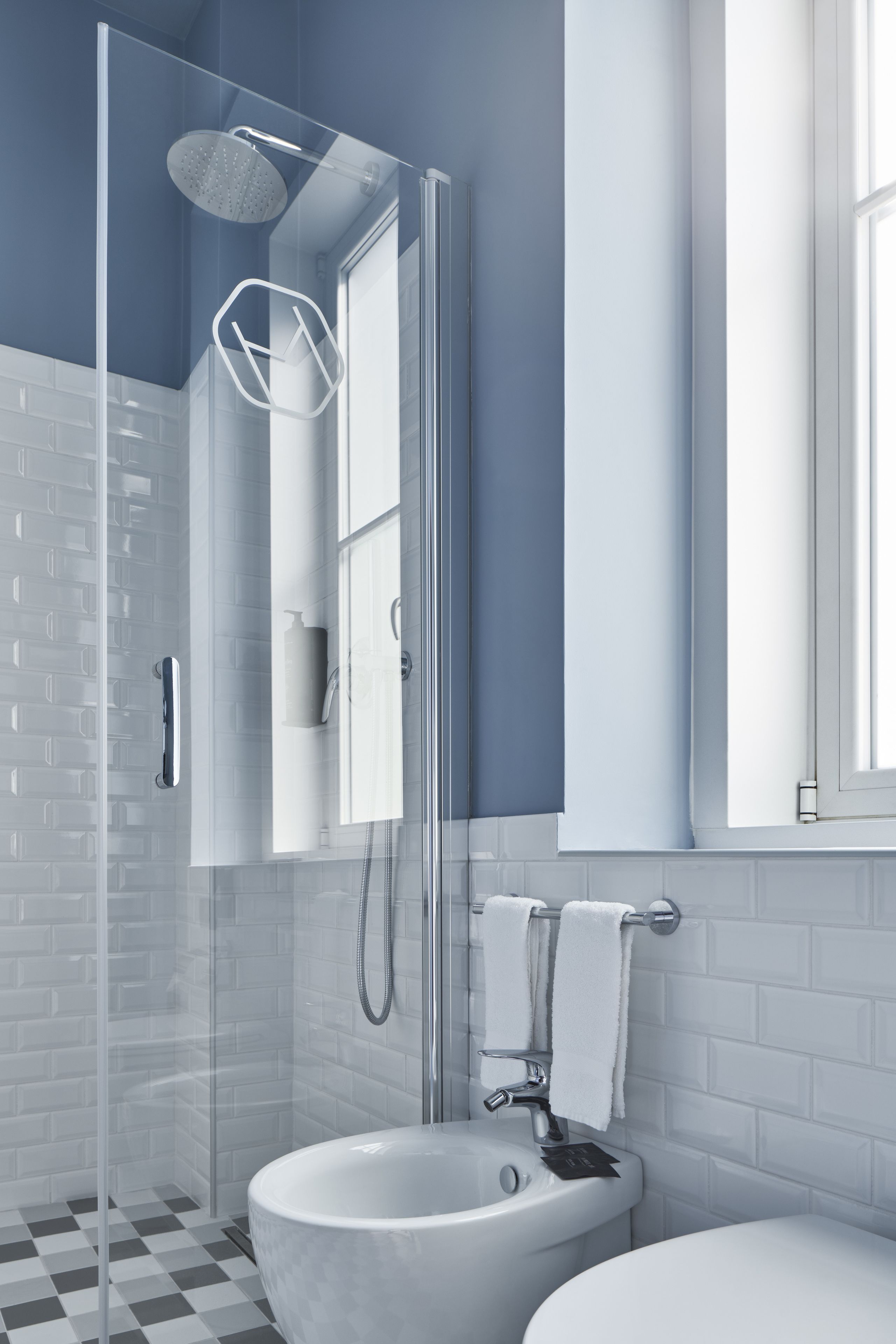 panoramic quadruple room (modernist king panoramic) | bathroom | shower, rainfall showerhead, slippers, bidet