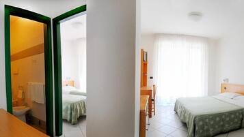 Classic Quadruple Room, Multiple Beds, Balcony | In-room safe, individually decorated, individually furnished