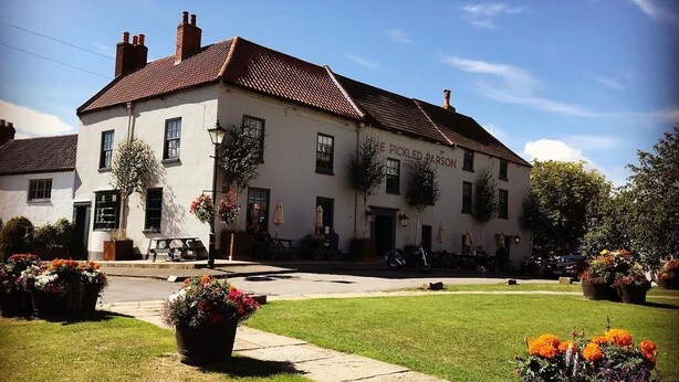 A pub named 'The Pickled Parson' with a traditional white facade, multiple windows, and a red-tiled roof. - The Pickled Parson of Sedgefield (Stockton-on-Tees)