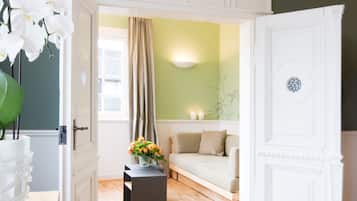 Suite, Lake View | Living area | Flat-screen TV