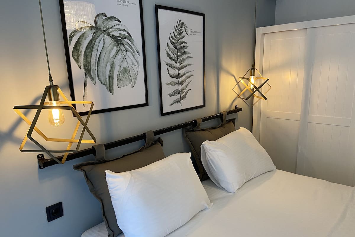 Laptop workspace, blackout drapes, cribs (free), WiFi (free)