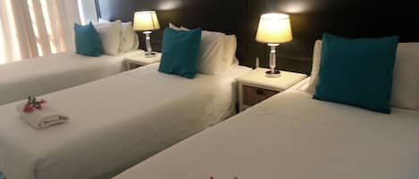 Triple Room | Premium bedding, free WiFi, bed sheets