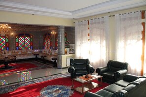 デラックス ヴィラ | リビング エリア | 薄型テレビ