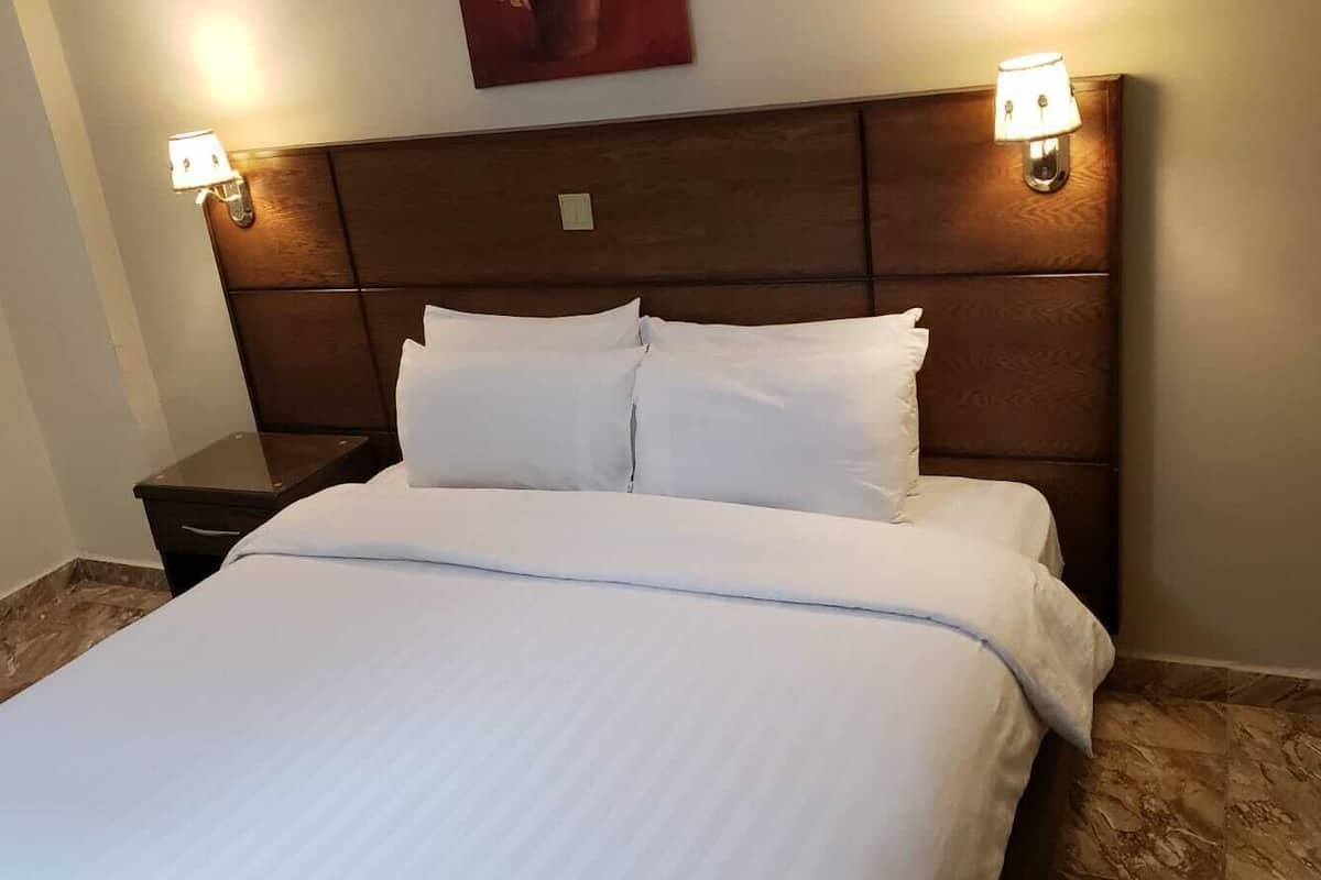 family quadruple room, multiple beds, city view | individually decorated, individually furnished, desk, blackout curtains