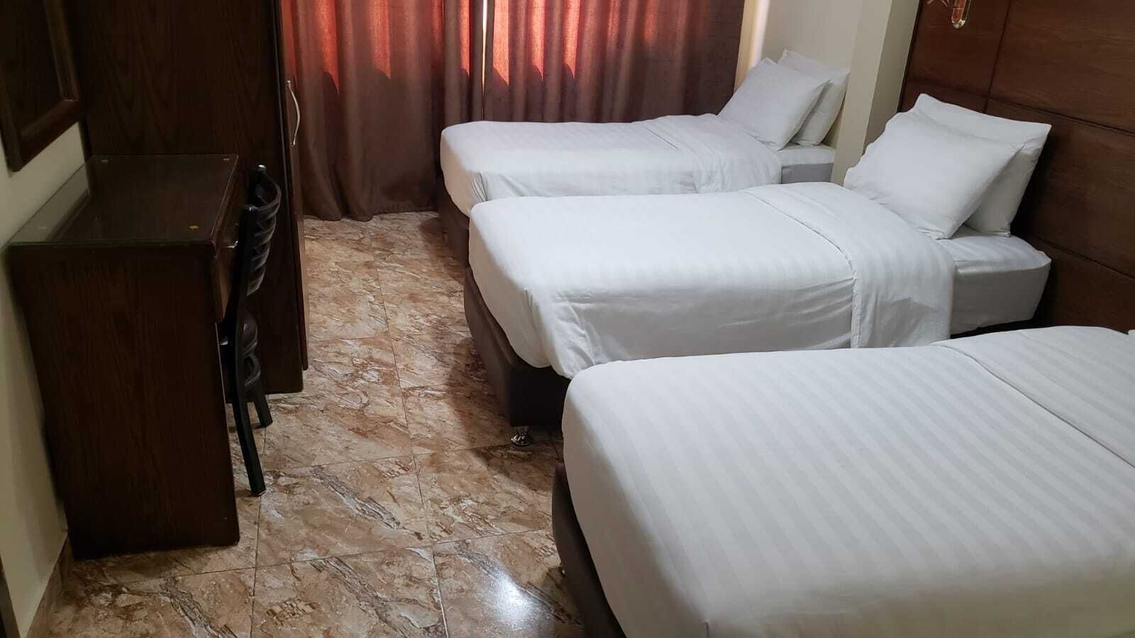 comfort triple room | individually decorated, individually furnished, desk, blackout curtains