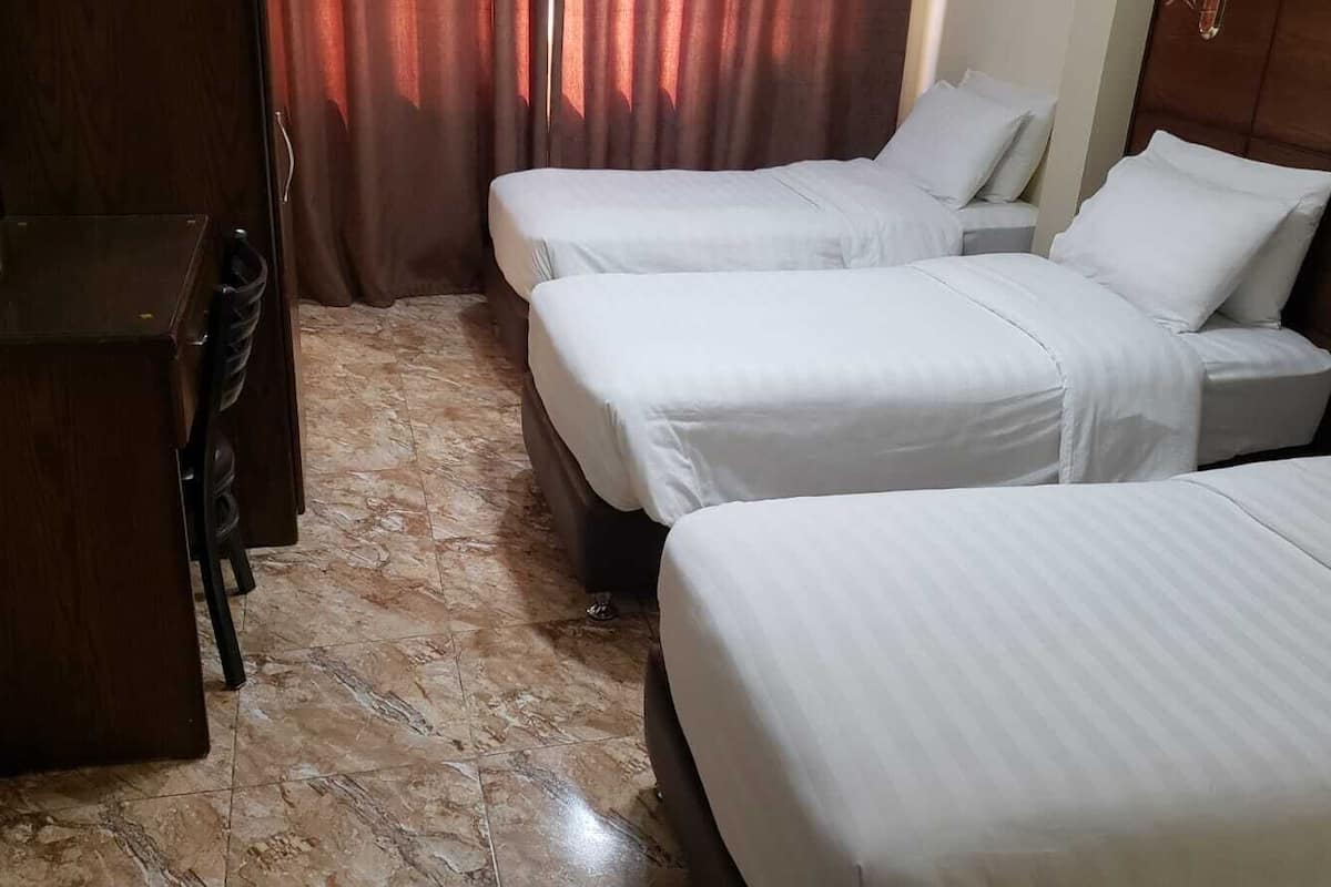 comfort triple room | individually decorated, individually furnished, desk, blackout curtains