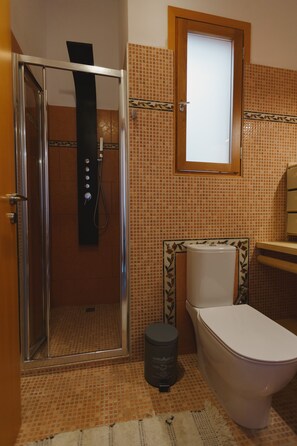 Hair dryer, towels, soap, shampoo