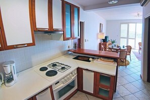 Apartment (Apartments Sipa - Comfort Two Bedroom) | Private kitchen | Fridge, microwave, oven, stovetop - Sipa Apartments (Dubrovnik)