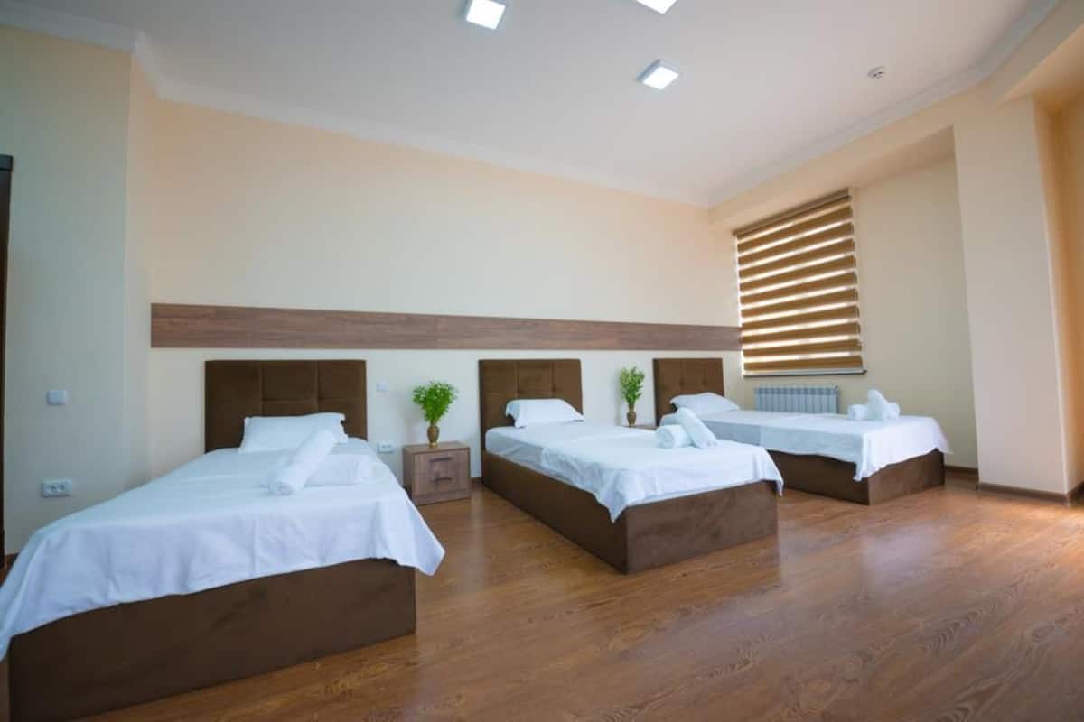 standard triple room, city view | desk, soundproofing, free wifi, bed sheets